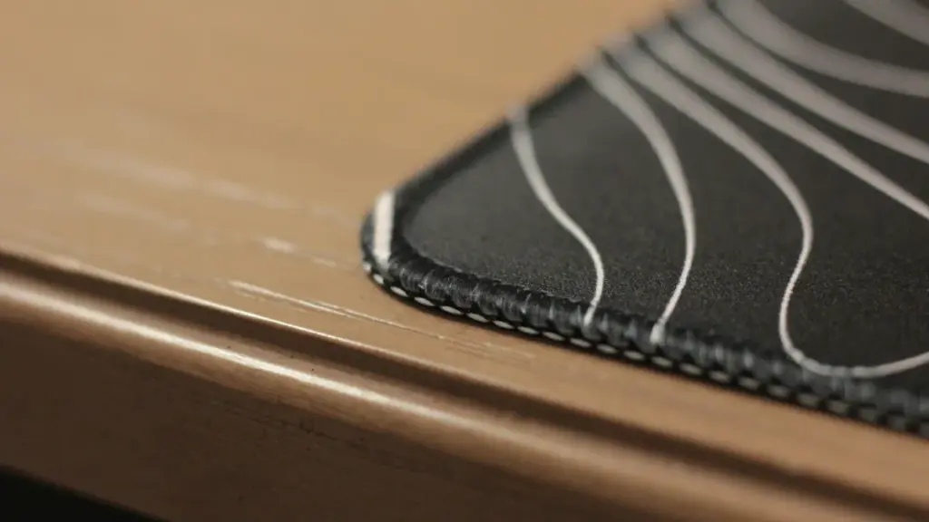 a close up of black mouse pad